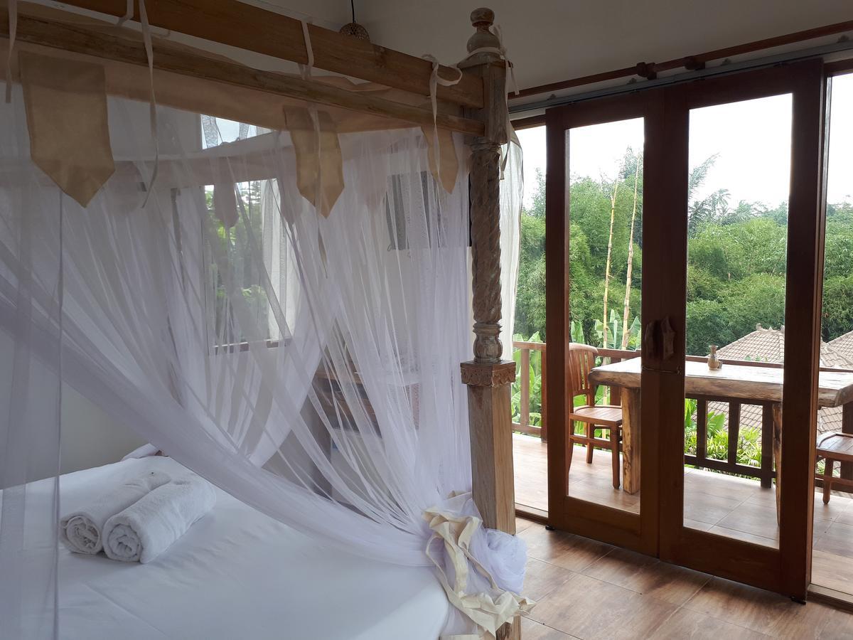 อูมาห์ โฮชิ Hotel เตกากาลัง ห้อง รูปภาพ